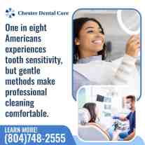 Smiling patient holding a mirror during a gentle dental cleaning for tooth sensitivity at Chester Dental Care.
