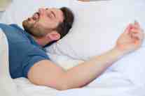 Man snoring do to sleep-disordered breathing  sleep apnea from developmental problems that can be treated by Chester Dental Care.