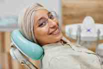 Woman smiling after receiving Pinhole Gum Rejuvenation at Chester Dental Care in Chester, VA