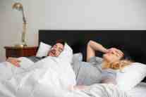 Couple struggling with snoring because they didn't receive laser snoring treatment at Chester Dental Care in Chester, VA