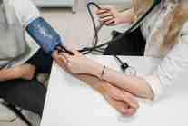 Person getting their blood pressure checked because they didn't receive sleep apnea treatment at Chester Dental Care
