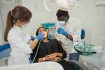 Patient being screened for oral cancer at Chester Dental Care in Richmond, VA